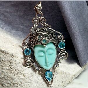 Carved Goddess stone with genuine blue topaz sterling Silver Pendant/ethical art
